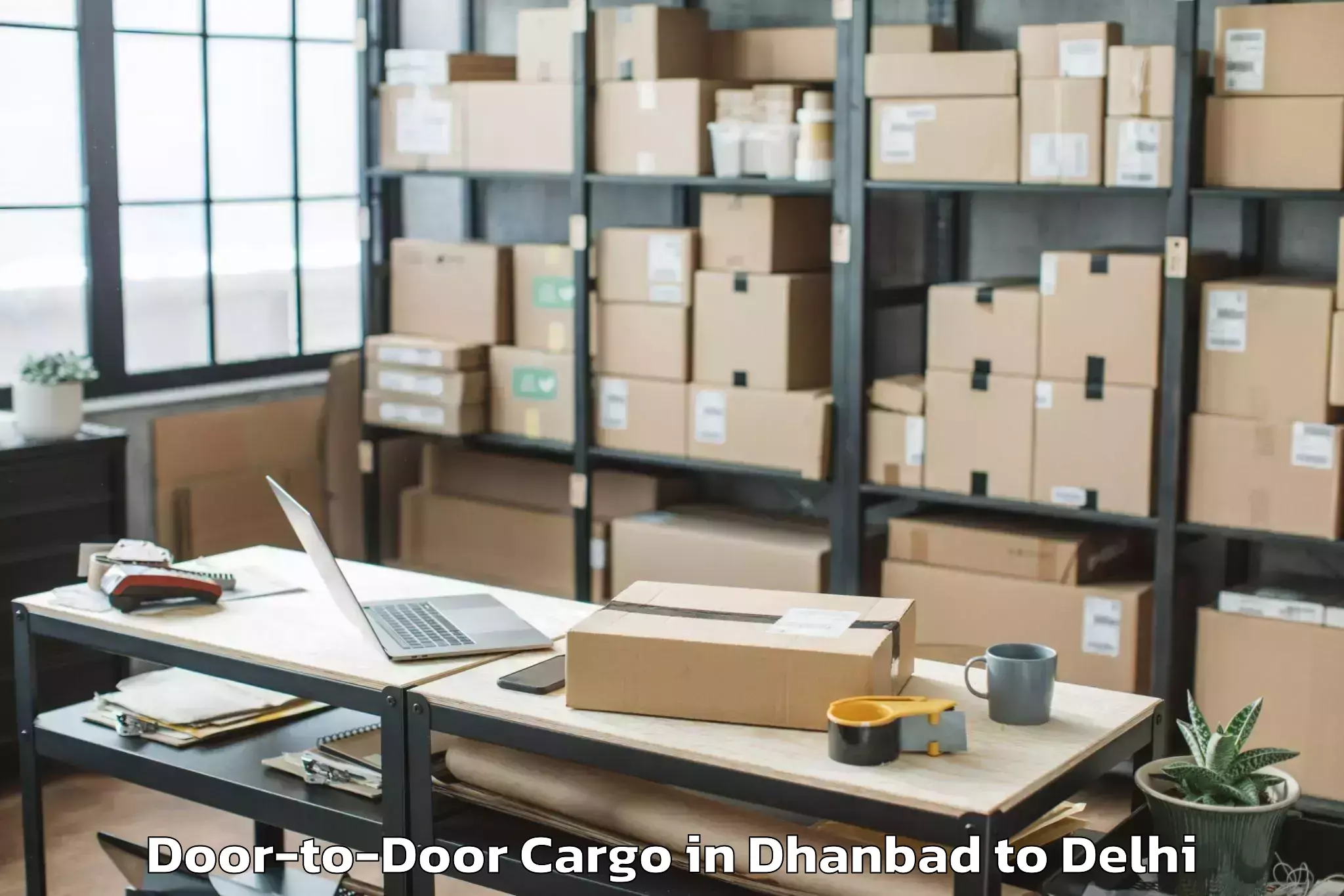 Book Dhanbad to Ambience Mall Rohini Door To Door Cargo